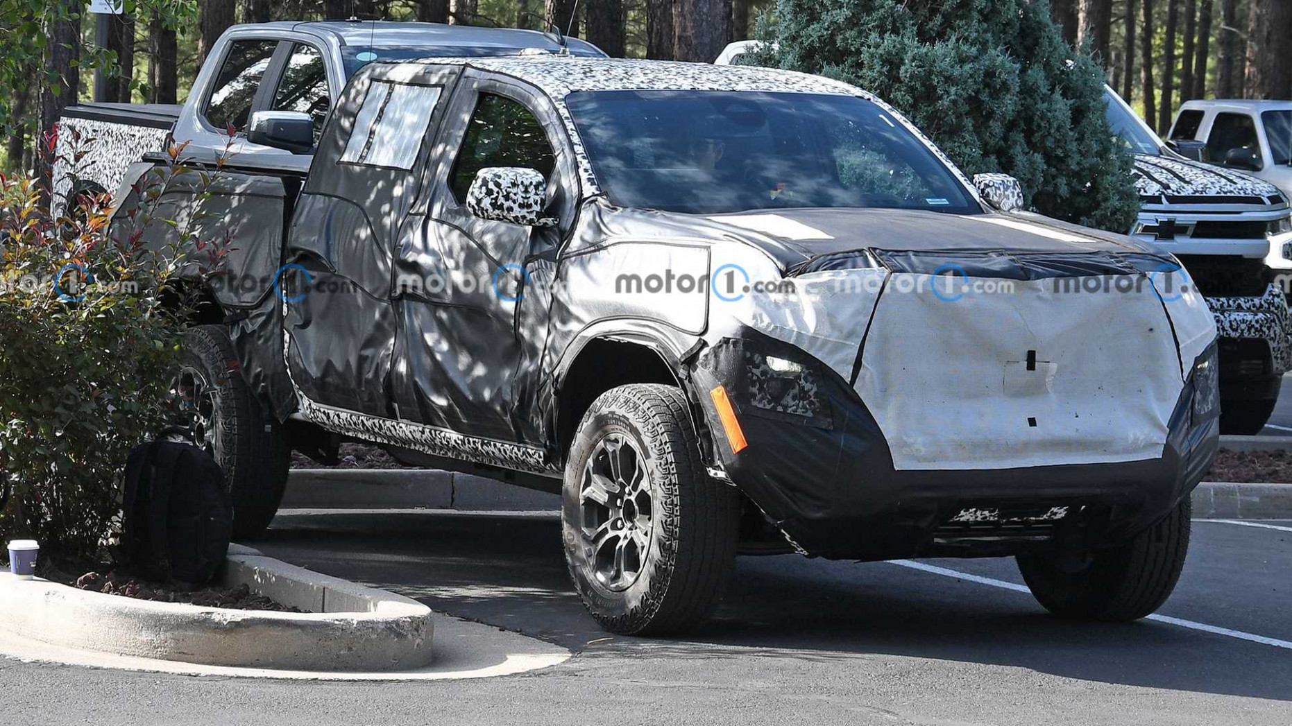 4 Gmc Canyon At4 Spied Hiding In Parking Lot Under Heavy Camo 2023 Gmc Canyon Updates