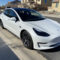 Prices tesla model 3 pearl white