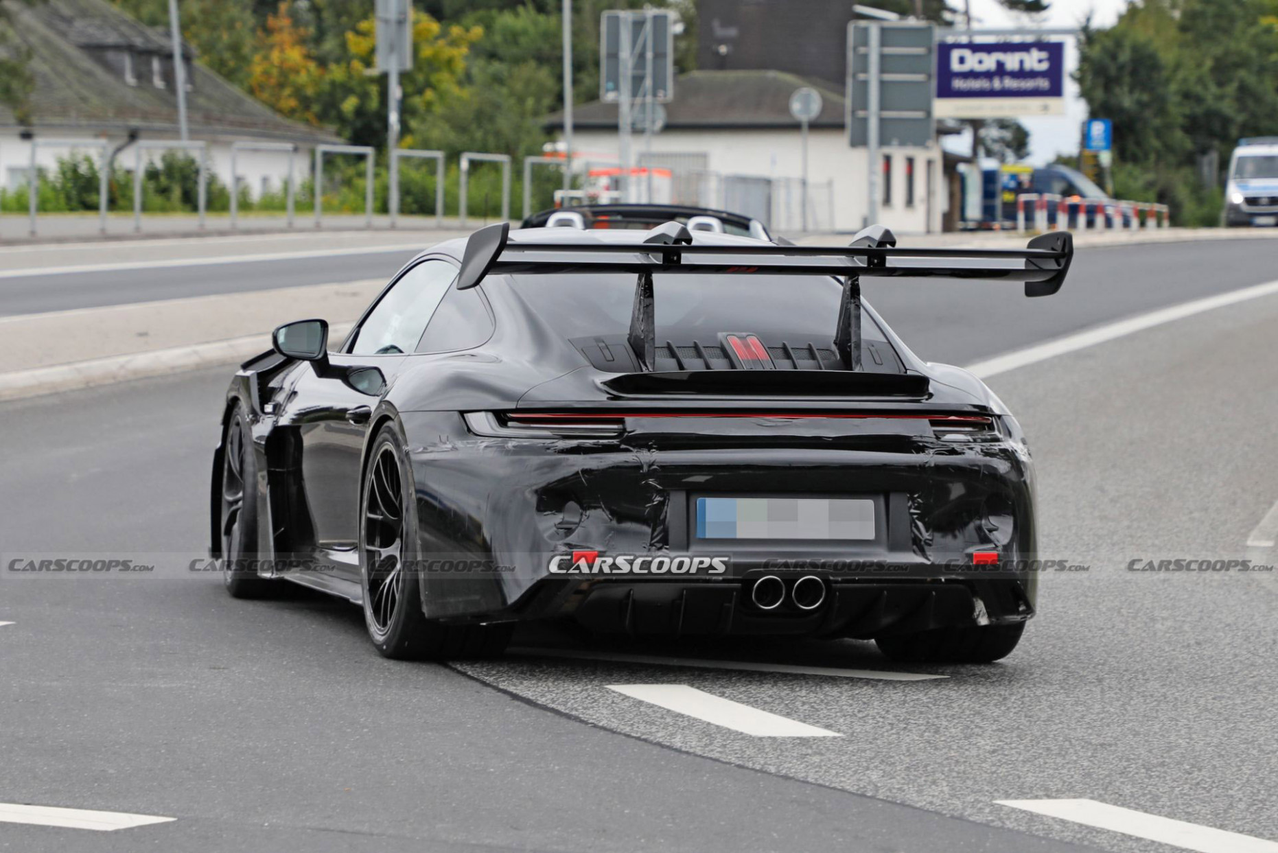 5 Porsche 5 Gt5 Rs Spied With Larger Hood Scoops And 2023 Porsche 911 Gt3 Rs